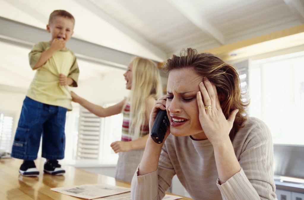 Stressed woman on telephone